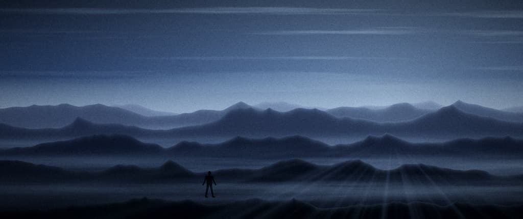 Figure against misty ridges
